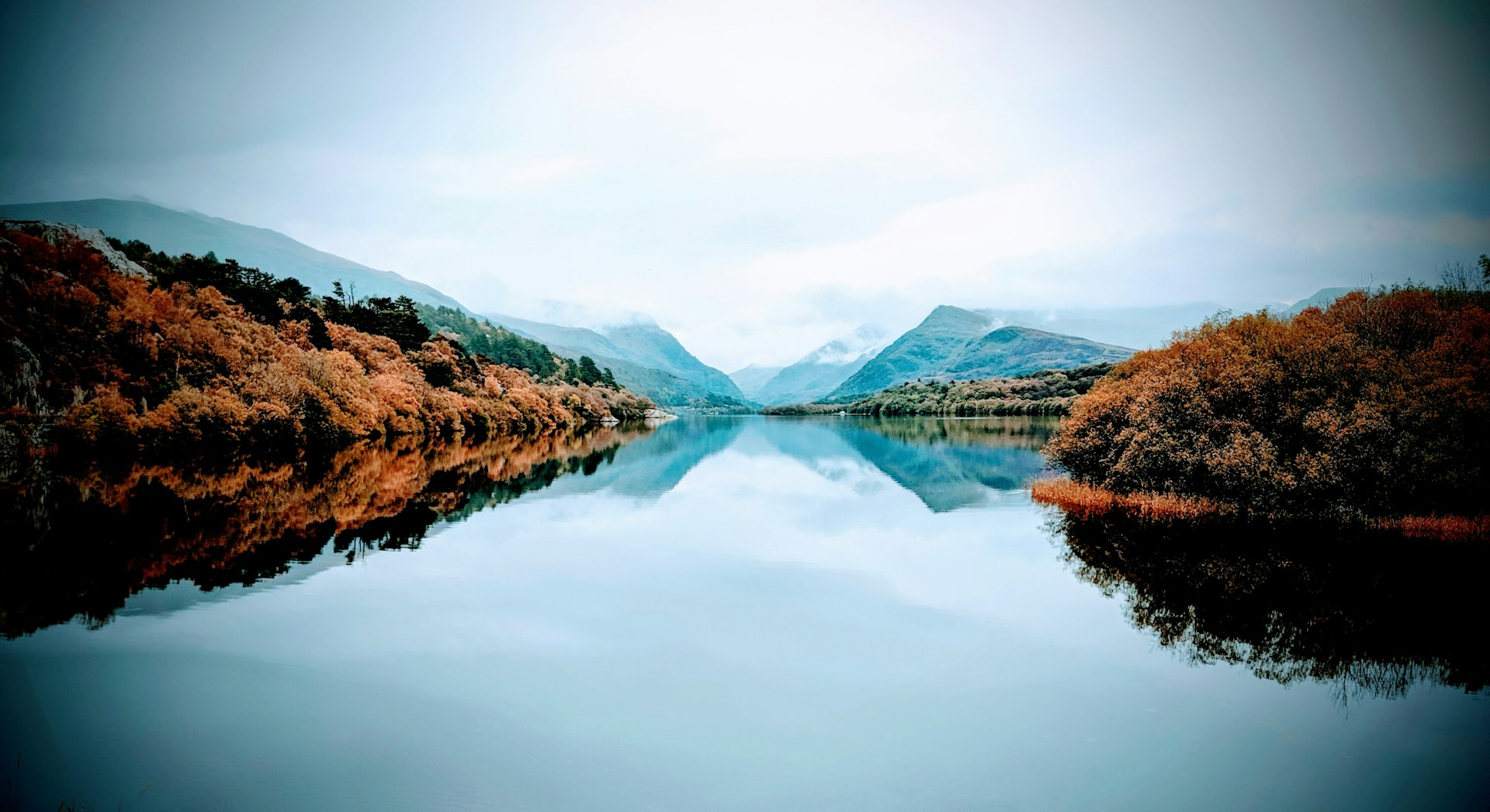 Serene Lake District with pristine mountains and reflective waters